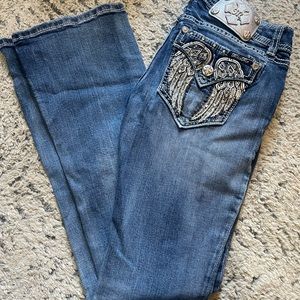 Size 27 signature boot cut miss me jeans with angel wings on back pockets